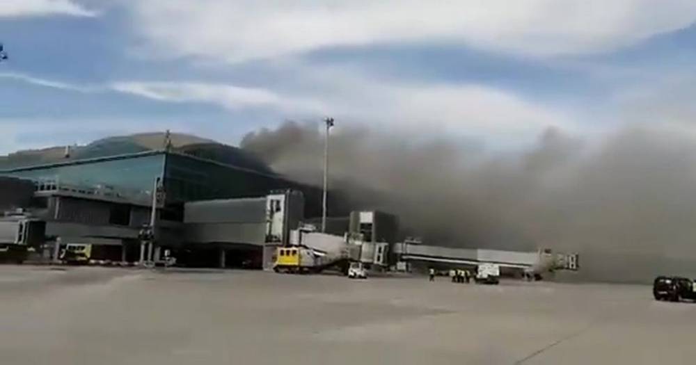 Alicante Airport fire sees flights delayed and passengers evacuated in the popular holiday spot - www.dailyrecord.co.uk - Spain - Scotland - county Valencia