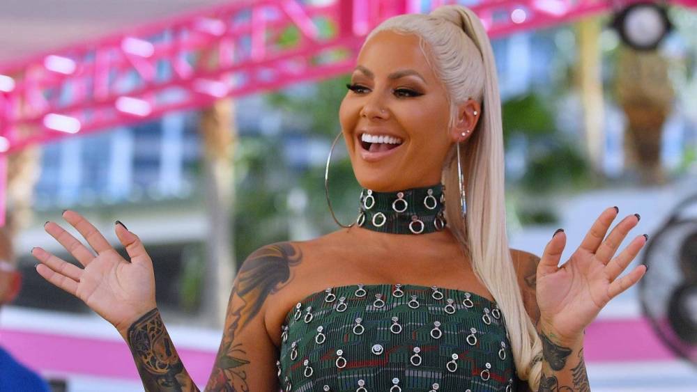 Amber Rose Claps Back at Critics Saying She's 'Too Pretty' for a Face Tattoo - www.etonline.com