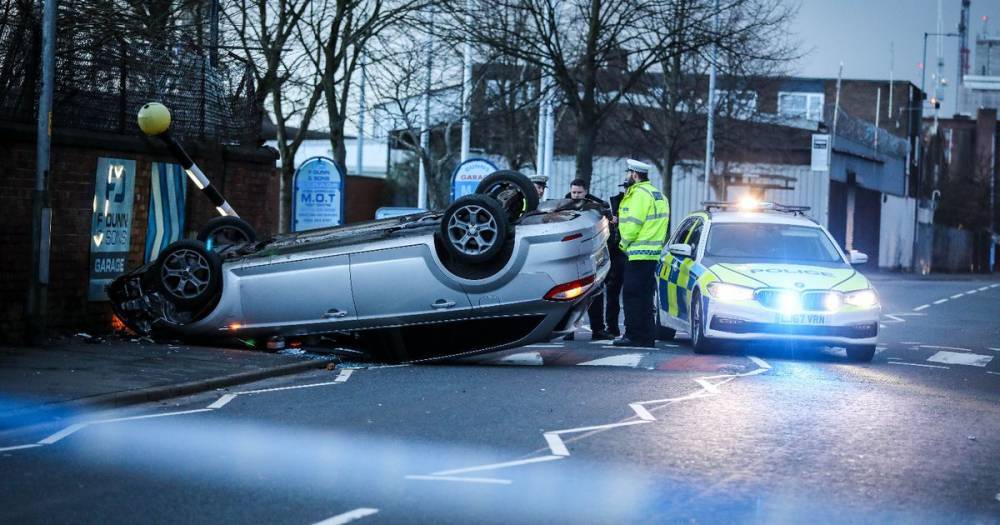 Man in hospital after Vauxhall being chased by police crashes into his car - leaving it on its roof - www.manchestereveningnews.co.uk