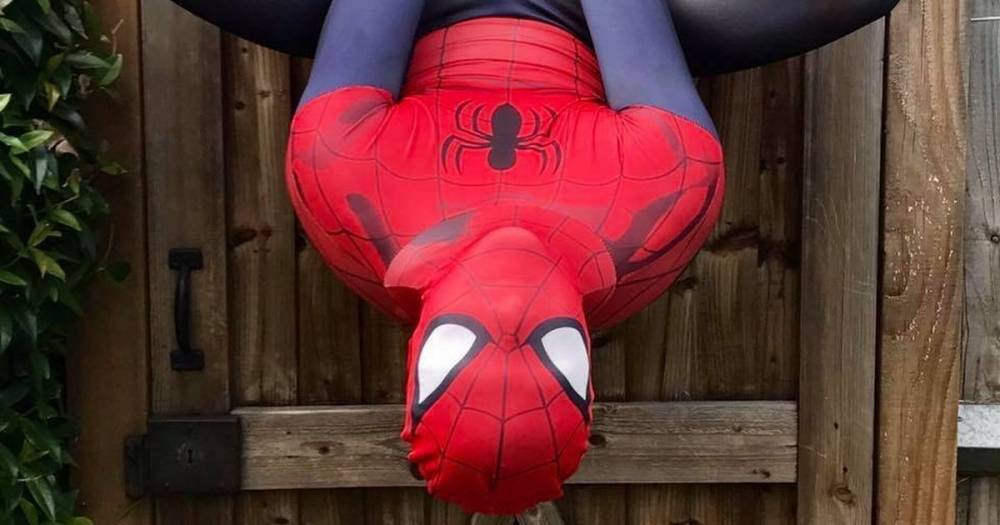 A charity fundraiser does lockdown exercise dressed as Spiderman to cheer up bored kids - www.dailyrecord.co.uk