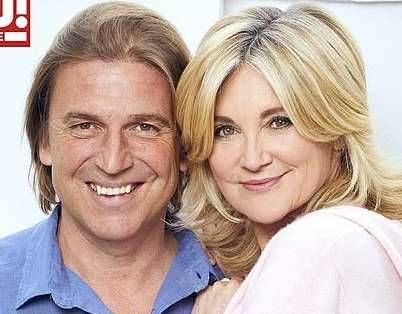 Anthea Turner reveals she's postponed her wedding due to COVID-19 crisis as she and fiancé Mark Armstrong beam in their first joint shoot - www.msn.com - London - Italy - county Armstrong