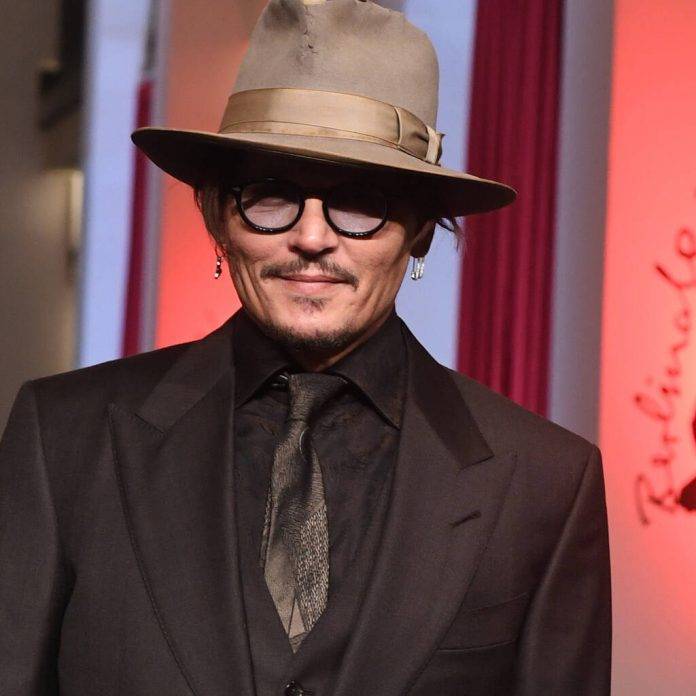 Johnny Depp finally finishes 14-year-old painting - www.peoplemagazine.co.za