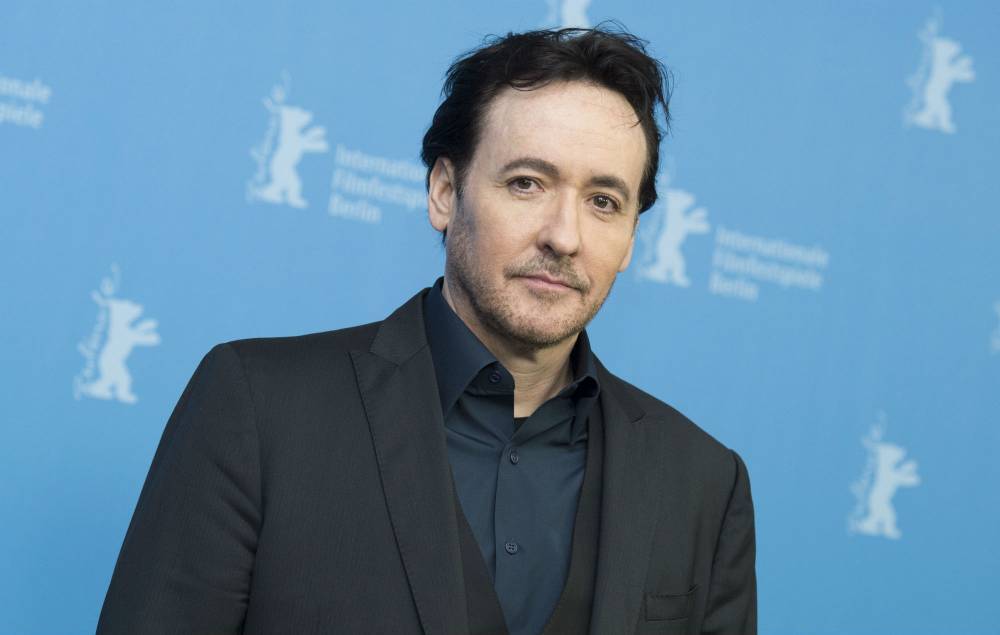 John Cusack claims police “came at me with batons” while he filmed Chicago’s George Floyd protests - www.nme.com - USA - Chicago - Illinois - George - Floyd