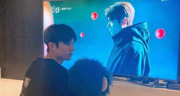 Lee Min Ho watches The King: Eternal Monarch Ep 14 with a cute prop from sets; Kim Go Eun shares BTS photos - www.pinkvilla.com