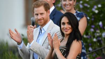 Prince Harry Says Wife Meghan Markle Sparked 'Awakening' in Him on Minority Issues - www.etonline.com - Britain