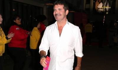 Simon Cowell pictured walking with son Eric following bike accident – details - hellomagazine.com - Malibu