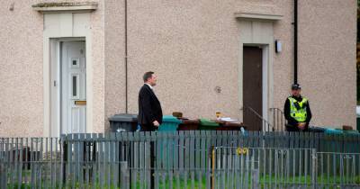 Cops stand guard as murder probe continues into ‘horrendous’ death of Airdrie man - www.dailyrecord.co.uk - county Rankin
