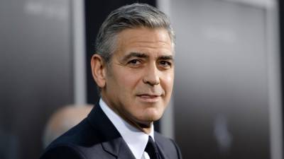 George Clooney's Chocolate-Covered 3-Year-Old Son Crashes His 'GQ' Interview - www.etonline.com