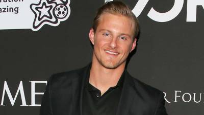 'Hunger Games' Star Alexander Ludwig Is Engaged to Lauren Dear: See the Ring! - www.etonline.com - Canada