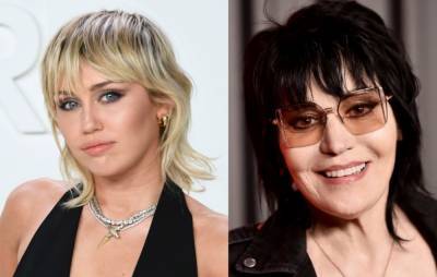 Listen to Miley Cyrus and Joan Jett team up on new track ‘Bad Karma’ - www.nme.com