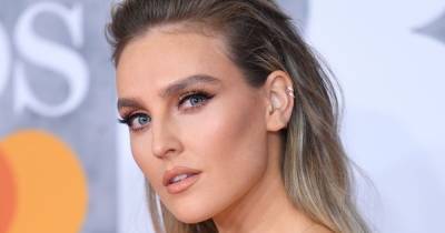 Perrie Edwards shows off stunning Christmas home makeover including festive stockings for her dogs - www.ok.co.uk - Manchester