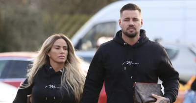 Katie Price and boyfriend Carl Woods put on loved-up display as they go shopping in matching tracksuits - www.ok.co.uk