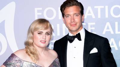 Rebel Wilson’s 5 Most Romantic Moments With BF Jacob Busch: Kissing On Winter Vacation More - hollywoodlife.com