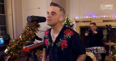 Robbie Williams performs four songs EXCLUSIVELY for Radio City - www.msn.com - city Radio