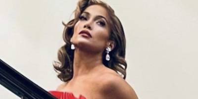 Jennifer Lopez Channels Mrs. Claus in a Bright Red Strapless Gown - www.marieclaire.com