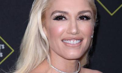 Gwen Stefani stuns fans with youthful appearance as she poses in tiny crop top - hellomagazine.com