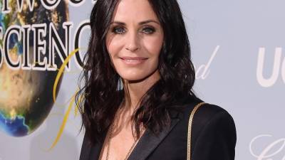 Courteney Cox stuns in little black bikini while 'diving' into her 56th year of life - www.foxnews.com