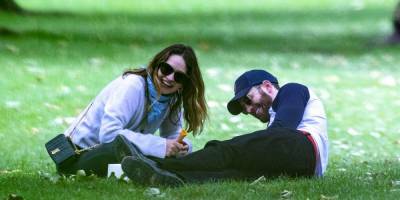 Here's Chris Evans and Lily James, Laughing and Cozied Up During Their London Park Date - www.elle.com - city London, county Park