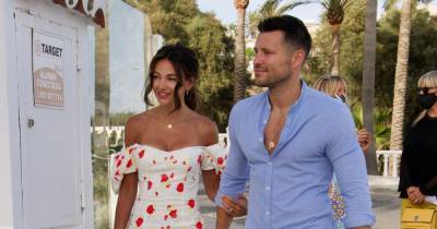 Michelle Keegan stuns in floral mini dress as she and husband Mark Wright put on loved-up display in Spain - www.ok.co.uk - Spain