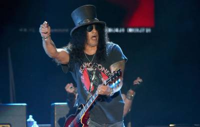 Guns N’ Roses reschedule North American tour dates for 2021 - www.nme.com - London - USA - Wisconsin - Milwaukee, state Wisconsin