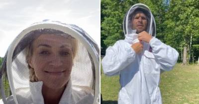 Carrie Underwood and Husband Mike Fisher Make Their Own Honey: See Them in Their Beekeeper Suits - www.usmagazine.com