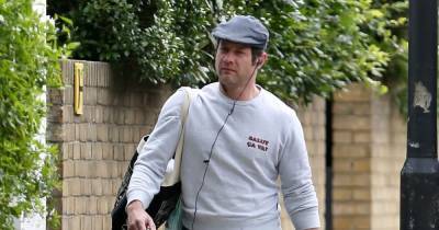 Dermot O’Leary looks tired but content as he takes break from daddy duties after birth of son Kasper with Dee Koppang - www.ok.co.uk
