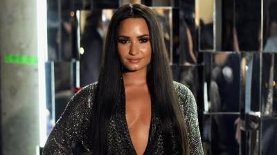 Demi Lovato Is Rewarding Fans Who Pledge to Vote With Personal Pieces From Her Closet - www.etonline.com - USA