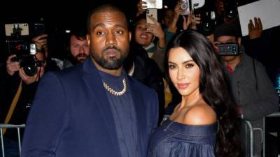 Kanye West Is 'Stepping Out on Faith' With Wife Kim Kardashian as They Share a Kiss in New Video - www.etonline.com - Choir