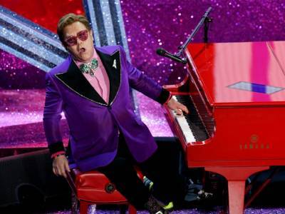 Elton John’s ex-wife 'attempted suicide' on honeymoon - canoe.com - Britain