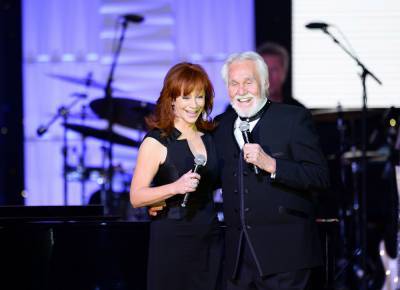Reba McEntire Says Kenny Rogers Saved Her ‘Sanity’ Following Plane Crash That Killed Her Band - etcanada.com - county San Diego - city Sanity