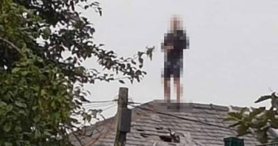 Police make arrest after five-hour rooftop stand-off with man - www.manchestereveningnews.co.uk - Manchester