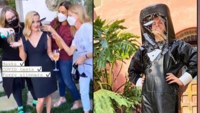 Emmys 2020: Meet the Hazmat Suit Man Who Was at Reese Witherspoon's Party (Exclusive) - www.etonline.com - Los Angeles
