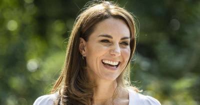Kate Middleton is SO pretty in pink M&S trousers for new appearance - www.msn.com - Britain - county Garden