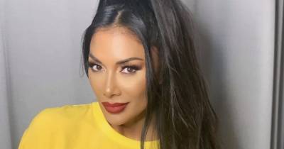 Nicole Scherzinger fans speculate whether she's pregnant as she deletes and reposts snap 'showing baby bump' - www.ok.co.uk