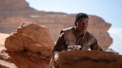 John Boyega Calls Out Disney For Pushing Black Characters Like His ‘To the Side’ in ‘Star Wars’ - stylecaster.com - Britain