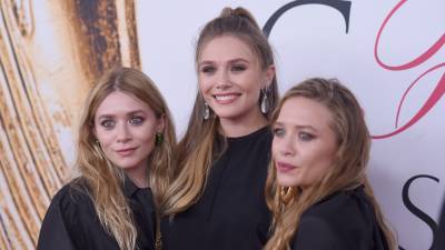 Elizabeth Olsen says growing up with famous sisters was a 'unique' experience - www.foxnews.com - Hollywood