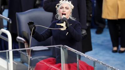 Lady Gaga Wears Custom Schiaparelli to Sing National Anthem at President Joe Biden's Inauguration - www.etonline.com - USA