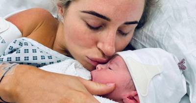 Dani Dyer shares new snap of newborn baby boy and admits 'I could stare at his little face all day long' - www.ok.co.uk