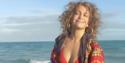 J.Lo Brings Out Her Tiny Red Bikini to Meditate to Drake - www.harpersbazaar.com