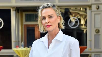 Charlize Theron on Relating to Morticia Addams' Desire to Connect With Her Kids (Exclusive) - www.etonline.com