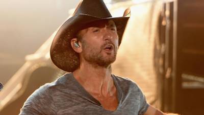 Tim McGraw Jumps Off Stage to Confront Audience Members Mid-Song - www.etonline.com - state Nevada - county Reno
