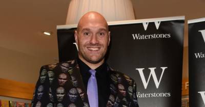 Tyson Fury wears a suit with his face plastered on as he supports wife Paris at book signing - www.ok.co.uk - Centre - city Manchester, county Centre