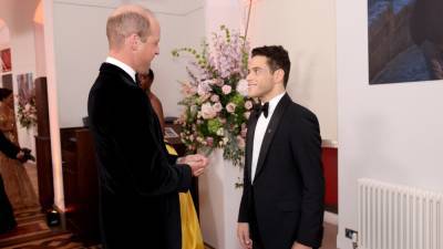 Rami Malek Shares His Approach to Speaking With Members of the Royal Family (Exclusive) - www.etonline.com - county Hall - county Charles