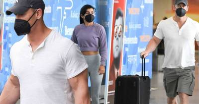 John Cena flashes his biceps at airport with wife Shay in New York - www.msn.com - Spain - New York - Florida - Canada