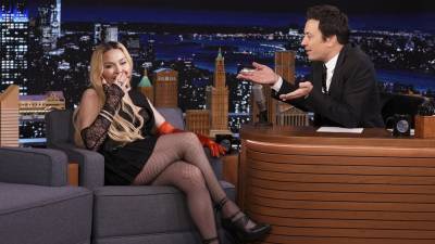 Madonna Climbs on Jimmy Fallon's Desk and Flashes Audience During 'Tonight Show' Appearance - www.etonline.com