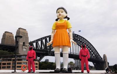 ‘Squid Game’: Giant ‘Red Light, Green Light’ doll appears in Sydney - www.nme.com