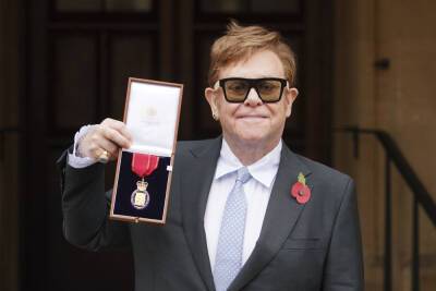 Sir Elton John Steps Out With Walking Stick As He Receives Top Honour From Prince Charles - etcanada.com