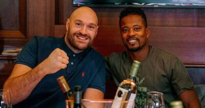Tyson Fury and Patrice Evra meet after Manchester United warning to players - www.manchestereveningnews.co.uk - Manchester - city Santo