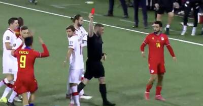 John Beaton brandishes Andorra vs Poland red card inside 20 SECONDS after brutal flying elbow - www.dailyrecord.co.uk - Scotland - Poland - Andorra