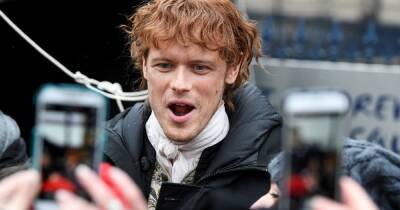 Outlander star Sam Heughan has fans in stitches after saying new book comes with a warning - www.dailyrecord.co.uk - Scotland